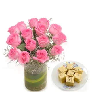 15 pink roses in glass vase with half kg sohan papdi