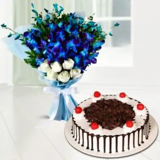 Elegant Bouquet of 10 blue orchids with 6 white roses with black forest cool cake 