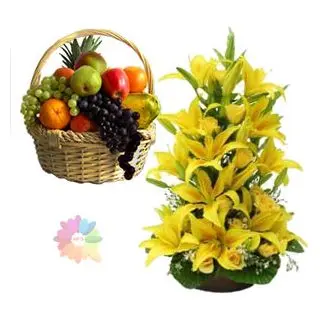 Exotic 2 feet height lilies arrangement with 3 kg seasonal mix fruits basket 