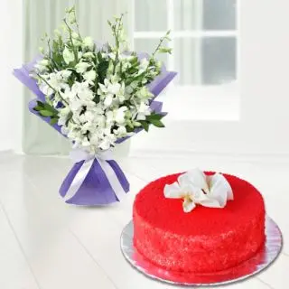 Exotic hand bouquet of 10 white orchids with red velvet cool cake 