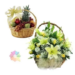 Exotic lilies and roses arrangement with 2 kg mix fruit basket 