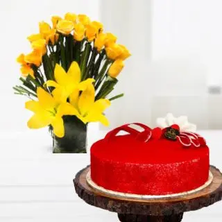 exotic vase arrangement of lilies and roses with red velvet cool cake 
