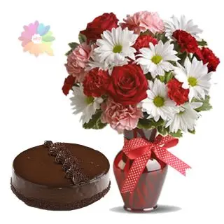 Fresh mix flowers arranged in glass vase with 1 kg chocolate truffle cake 