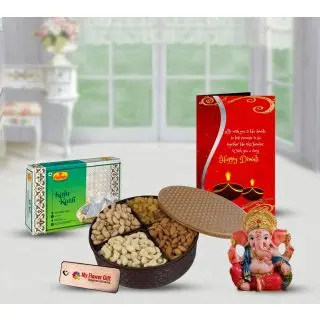 Assorted Dry fruits box, Kaju Katli sweets, greeting card with Ganesha idol