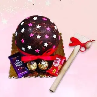 Half kg chocolate piñata cake with dairy milk, kitkat and rocher ferrero chocolates