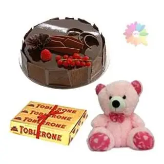  chocolate truffle cake with set of 3 toblerone chocolates with 1 feet height pink teddy bear