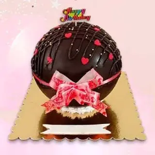 Half kg Double chocolate pinata cake with red hearts fondant topping 