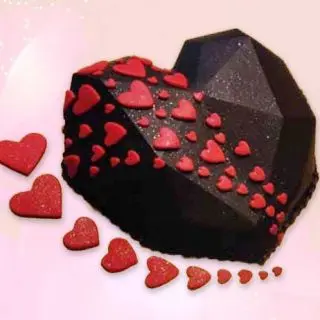 Half kg heart shape pinata theme cake  in chocolate  truffle flavour 