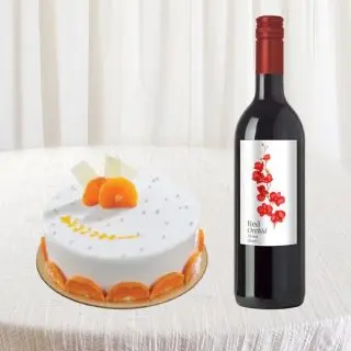 Half kg orange cake with bottle of wine 