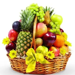 Seasonal 4 kgs Mix fruit Basket with Flowers