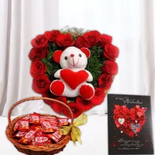 Heart Shape Arrangement of 20 red roses with teddy bear witting in it, basket of kit kat chocolates, valentine card 