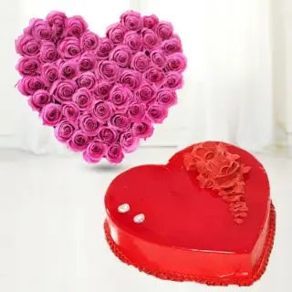 Heart shape arrangement of 40 pink roses with 1 kg heart shape strawberry cake 