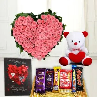 Heart shape arrangement of 50 pink roses, basket of assorted chocolates, 6 inch teddy bear, valentine day greeting card 