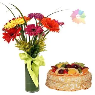 Mix colour gerberas arranged in glass vase with 1 kg mix fruit cake