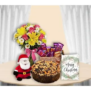 Mix flowers arranged in glass vase, dryfruits plum cake, Basket of dairymilk silk ,santa soft toy, christmas greeting card