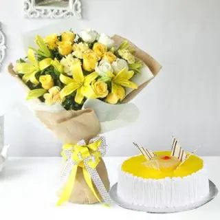 Bunch of lilies&roses with 1 kg  butterscotch fresh cream cake 