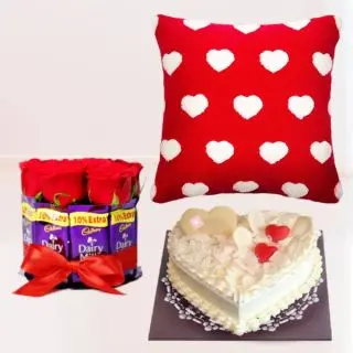 Photo cushion with half kg heart shape white forest cake , and a cute chocolate bouquet of 5 roses and 5 dairy milk