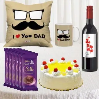 Photo mug with photo cushion, set of 6 dairy milk silk chocolates, half kg pineapple cake, bottle of red wine 
