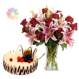 Pink lilies with red roses arranged in glass vase with 1 kg vanilla cake