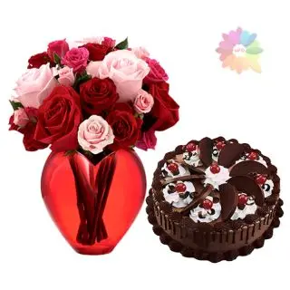 Red and pink roses arranged in glass vase with 1 pound chocolate delight fresh cream cake