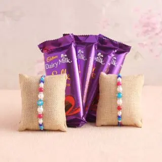 Set of 3 dairy milk silk with 2 rakhis 