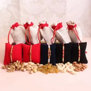 set of 5 rakhis with half kg assorted dry fruits  