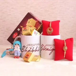 Set of bhaiya bhabhi rakhi , with 2 photo mugs with mewa bytes sweets from haldiram with half kg soan papdi sweets