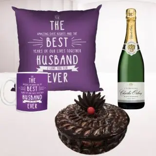 Set of photo cushion with photo mug, half kg chocolate fudge cake with bottle of champagne 