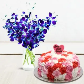 Vase arrangement of 10 blue orchids with floral theme cake in vanilla flavour 