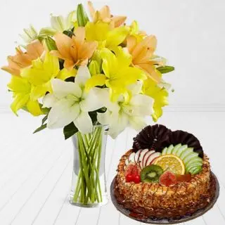Vase arrangement of 10 mix colour lilies with premium quality butterscotch cool cake 