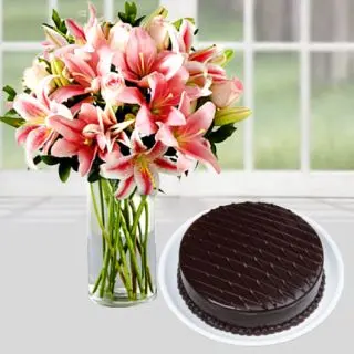 vase arrangement of 10 pink lilies with chocolate cake 