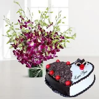 Vase arrangement of 10 purple orchids with heart shape black forest cake