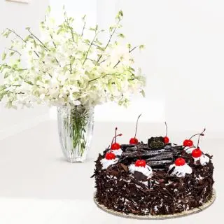 Vase arrangement of 10 white orchids with black forest cool cake 