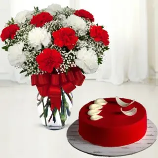 Vase arrangement of 12 red and white carnations with red velvet cool cake 