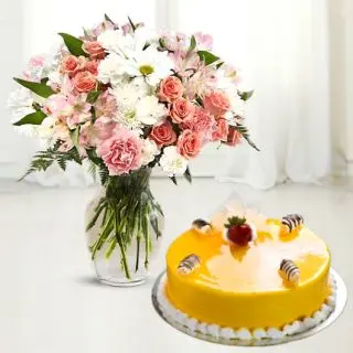 Vase arrangement of 15 mix flowers with mango cake 
