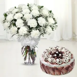 Vase arrangement of 20 red roses with red carnations flowers with heart shape black forest cake 