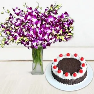 Vase arrangement of 25 purple orchids with black forest cool cake 