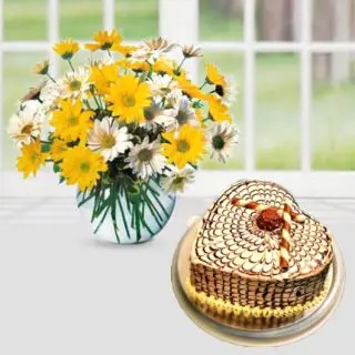 Vase arrangement of 25 yellow and white gerberas with heart shape butterscotch cool cake 