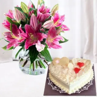 Vase arrangement of 5 pink lilies with heart shape white forest cool cake 