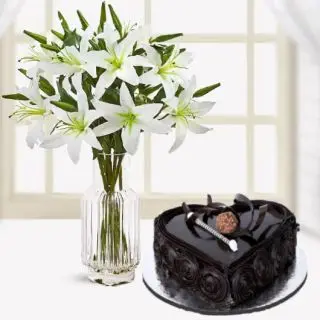 Vase arrangement of 5 white asiatic lilies with 1 kg heart shape double chocolate cake 