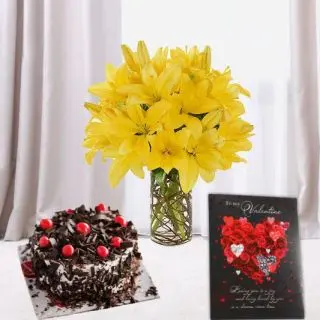 Vase arrangement of 5 yellow asiatic lilies, half kg black forest cool cake, with valentine greeting card 