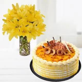 vase arrangement of  7 yellow lilies with honey cool cake 