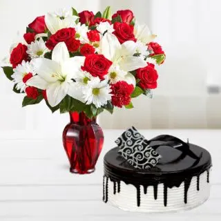 Vase arrangement of lilies, roses and daisies, choco vanilla cake 