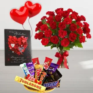 vase arrangement of red roses with red carnations, valentine card, 2 heart shape balloons , basket of assorted chocolates
