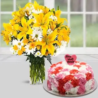 Vase arrangement of yellow lilies with white daisies with floral theme cakes