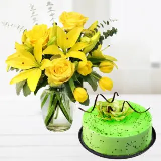 Vase arrangement of yellow lilies with yellow roses with kiwi cakes