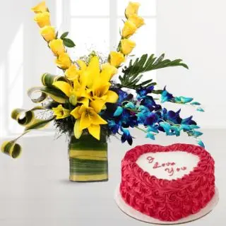 Vase arrangement of yellow roses with blue orchids with red velvet heart shape cake 