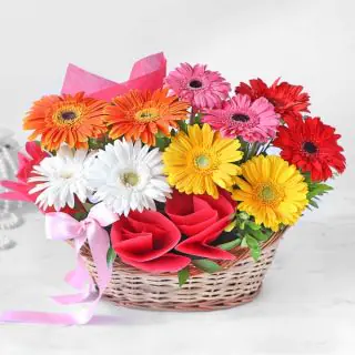 Basket arrangement of 20 mix colour gerberas